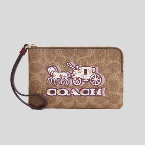Sac Coach COACH Wristlet à fermeture éclair d'angle en toile Signature avec motif Horse And Carriage CX589