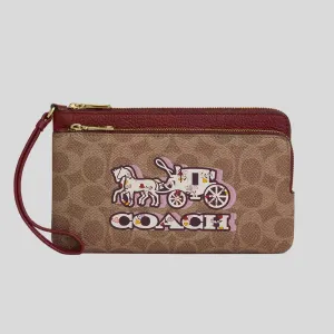 Portefeuille Double Zip COACH en toile Signature avec motif Cheval et Carrosse CX590