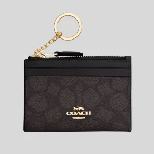 Porte-cartes COACH Mini Skinny ID en toile Signature couleur noyer/noir CW870