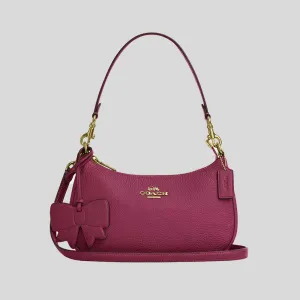 Sac à main COACH COACH Teri à bandoulière avec charme en nœud rose CY654