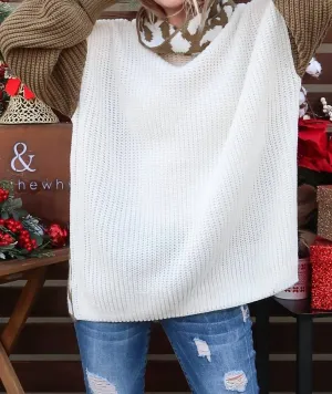 Pull col roulé à motifs léopard et blocs de couleur