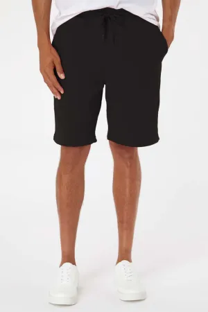 Independent Trading Company Shorts en Polaire pour Homme avec Poches - Noir