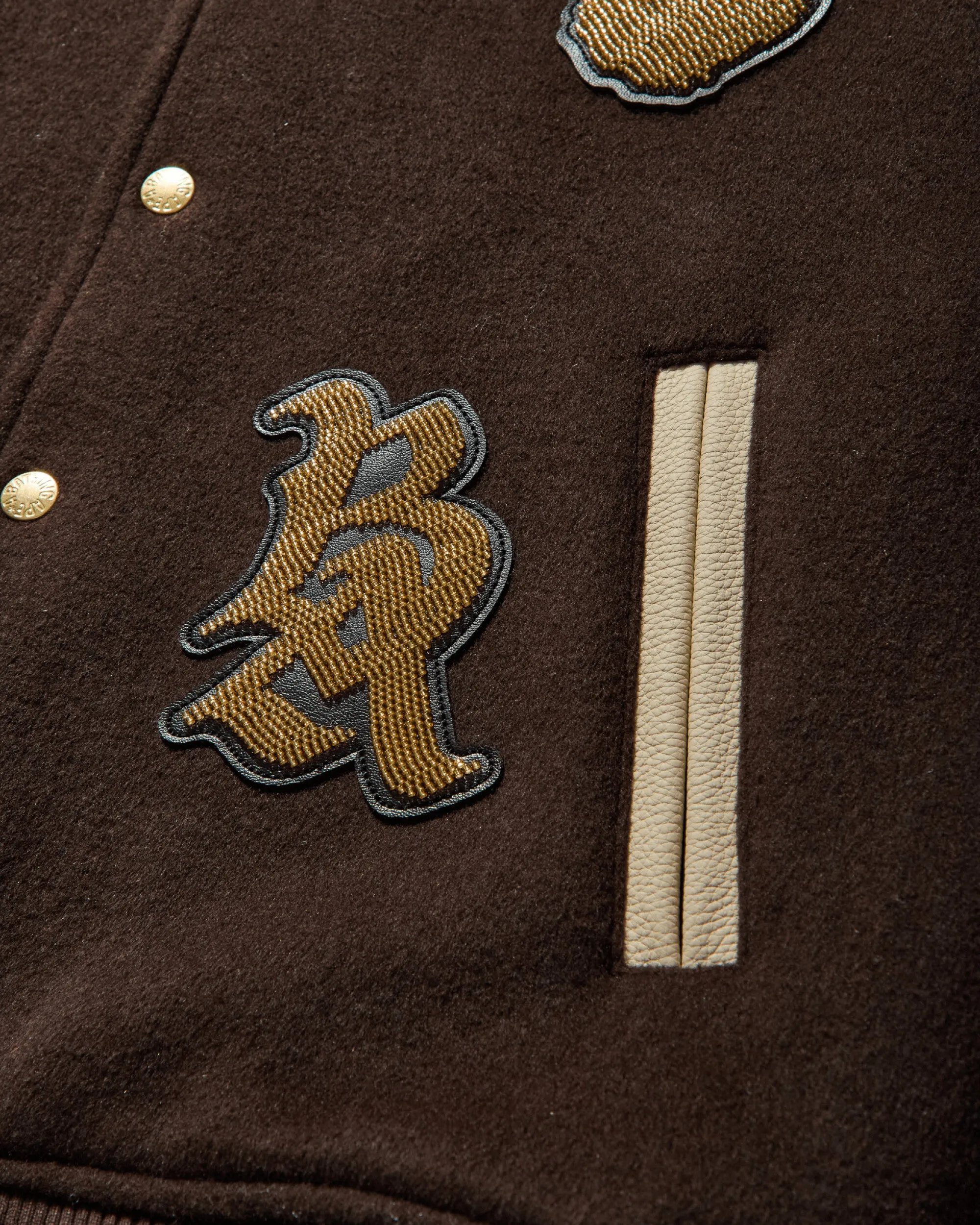 Veste de varsity en laine à motifs camouflage multi-logo marron pour homme