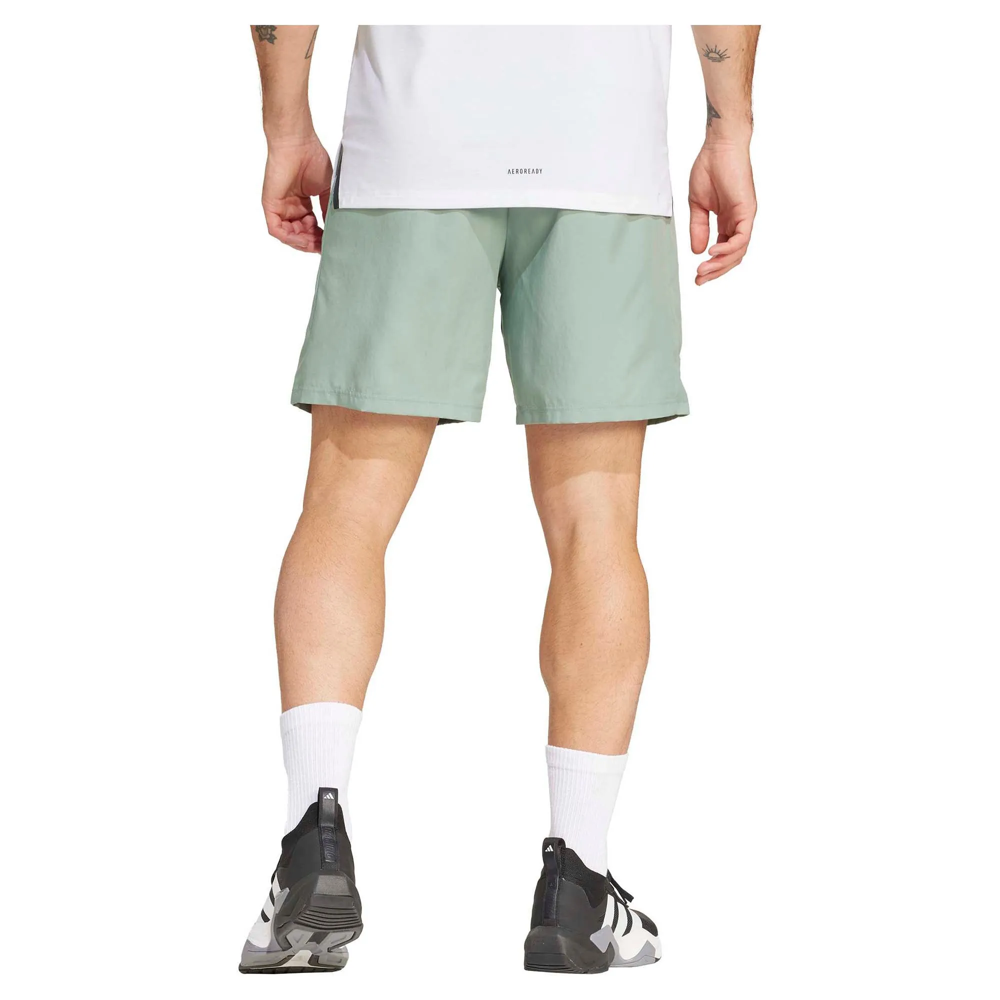 Short d'entraînement Essentials en tissu tissé 7 pouces pour homme