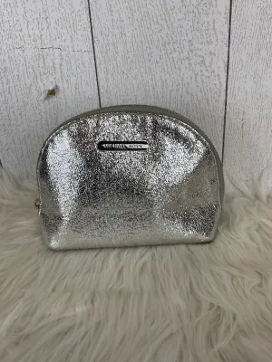 Trousse de maquillage Michael Kors, créée par le designer Michael Kors, taille petite
