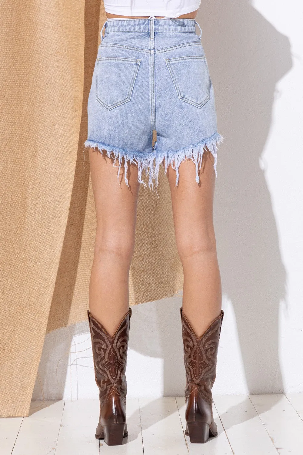 Short en jean à franges avec strass